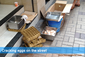 Food Safety Fail - Cracking eggs in the street